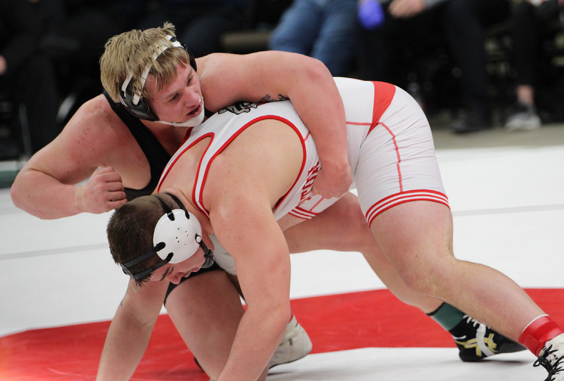 Eli Fjell wrestles Luke Pawloski (Plstn.) in the state finals. PCN photo by Travis Lane.