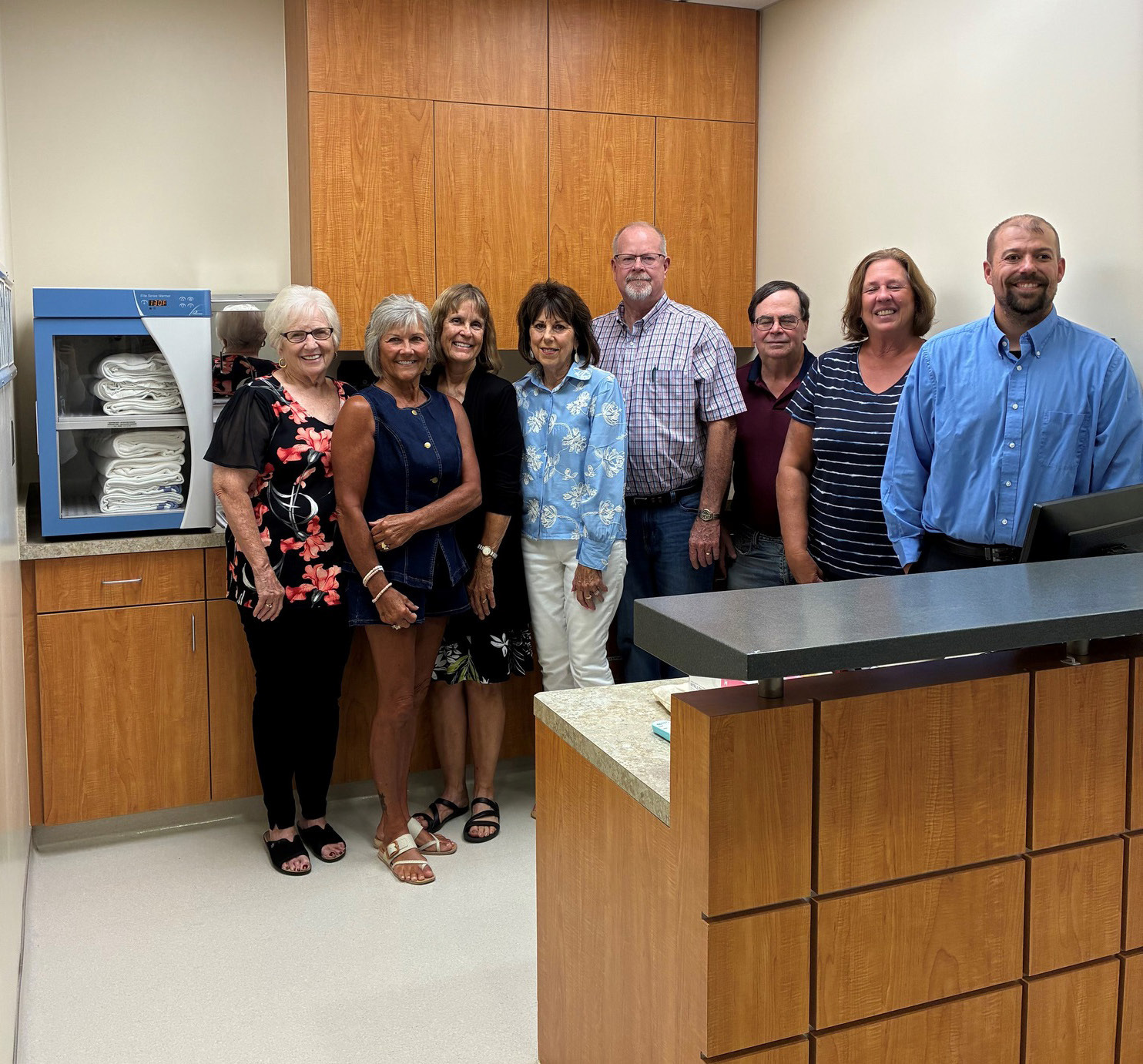 The Foundation forAnnie Jeffrey donated funds from their annual golf tournament to purchase a new blanket warmer (far left) for Annie Jeffrey Health Center. Board members are pictured with Marcus Augustin (right), CEO. Photo provided.