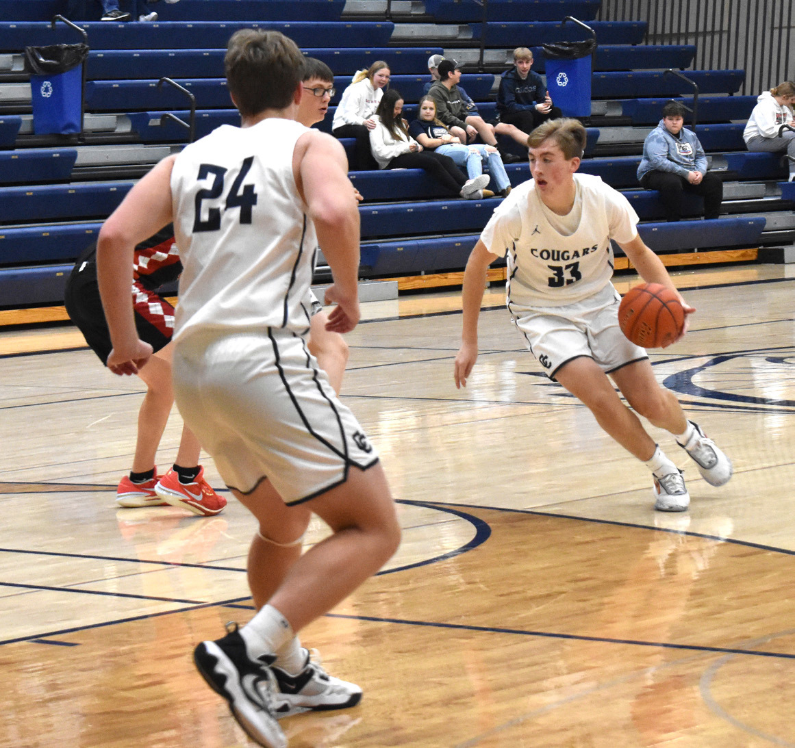 Ashton Seim dribbles it in while Alex Noyd helps on defense. PCN file photo.