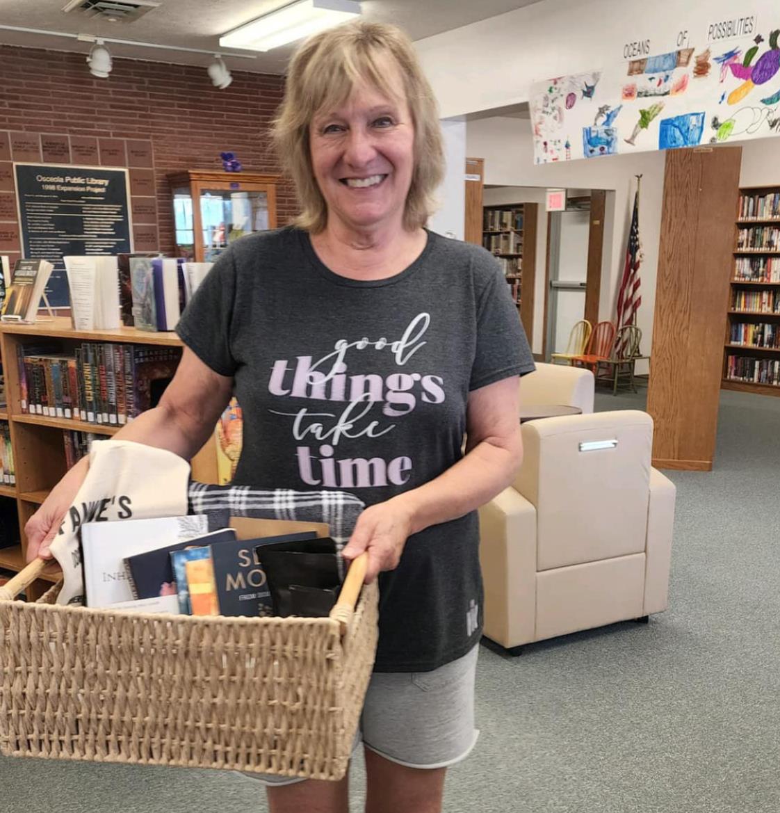 Brenda Lemburg Wins Prize from Q150 Author Event