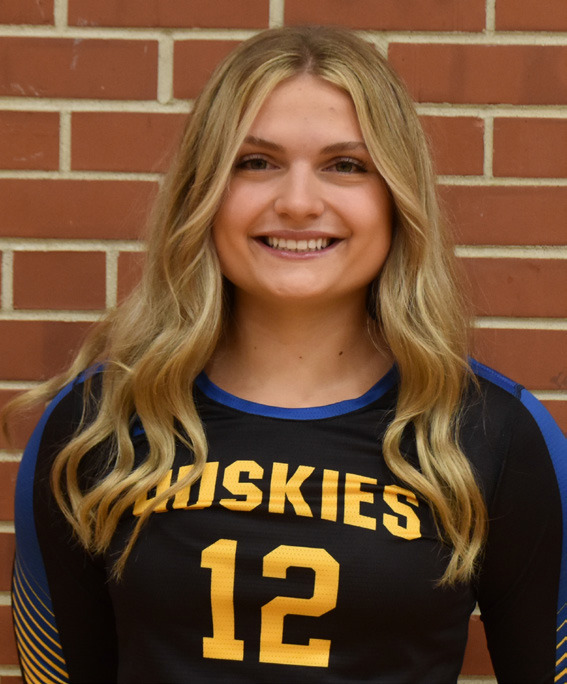 AVA LARMON - Ava led the Huskies with 21 kills and 7 blocks to claim victory over the Hawks.