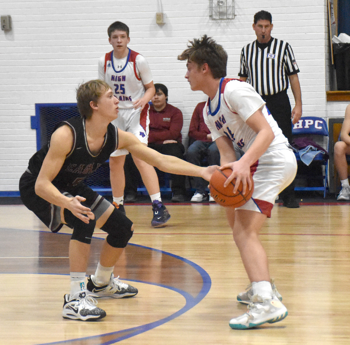 Ayden Hans prepares to make a move for the basket on Friday against BDS. PCN photo by Beth Sparrow