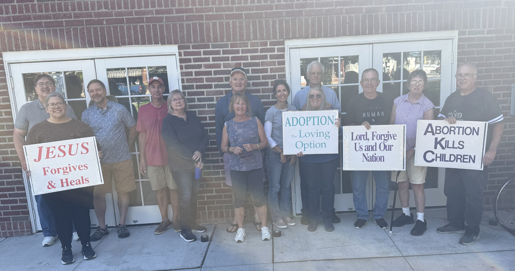 About 19 people participated in life chain on Sunday, October 4th in Stromsburg. Some left before the photo was taken. Photo provided.