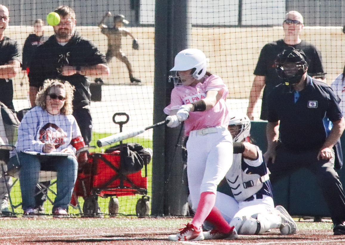 Polk County/Aquinas’ Chloe Schott doubles in a run during the Slammers 8-6 win over Raymond Central in Lincoln. PCN photo by Ken Kush.