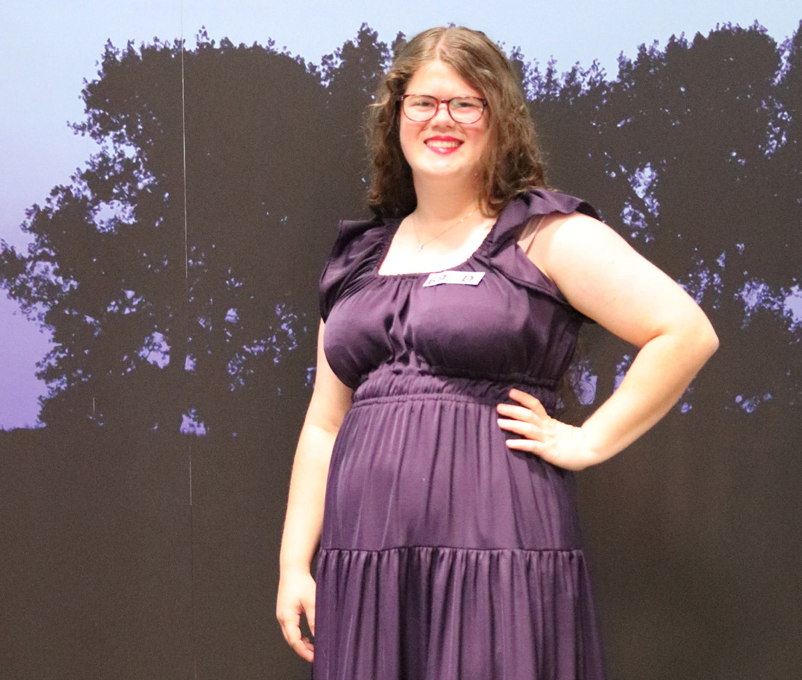 Above: Rebecca Wacker received a purple ribbon for her purple dress. Below: Alayna Gabel received a purple ribbon for her black outfit. Photos provided by Polk County 4-H Extension Office.