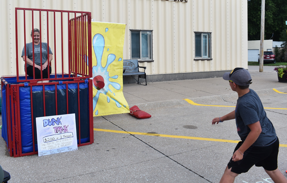 The favorite at last week's farmer's market was the dunk tank. Mrs. Thompson was dunked several times by her favorite students. PCN Photo by Beth Sparrow.