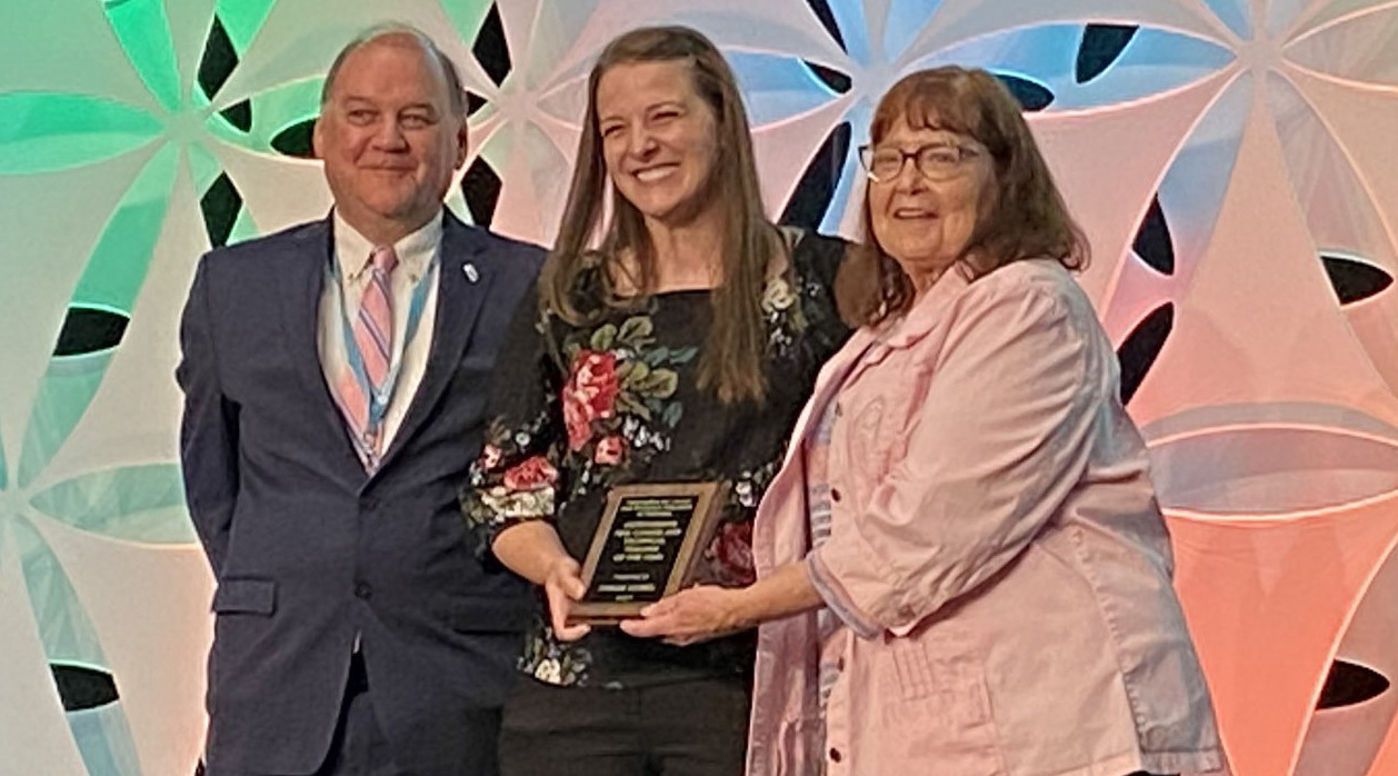 Sarah Hubel, FCS teacher and FCCLA advisor at Cross County (above center) was named the 2023 new teacher of the year by ACTEN (Association for Career and Technical Education of Nebraska). Photo provided.