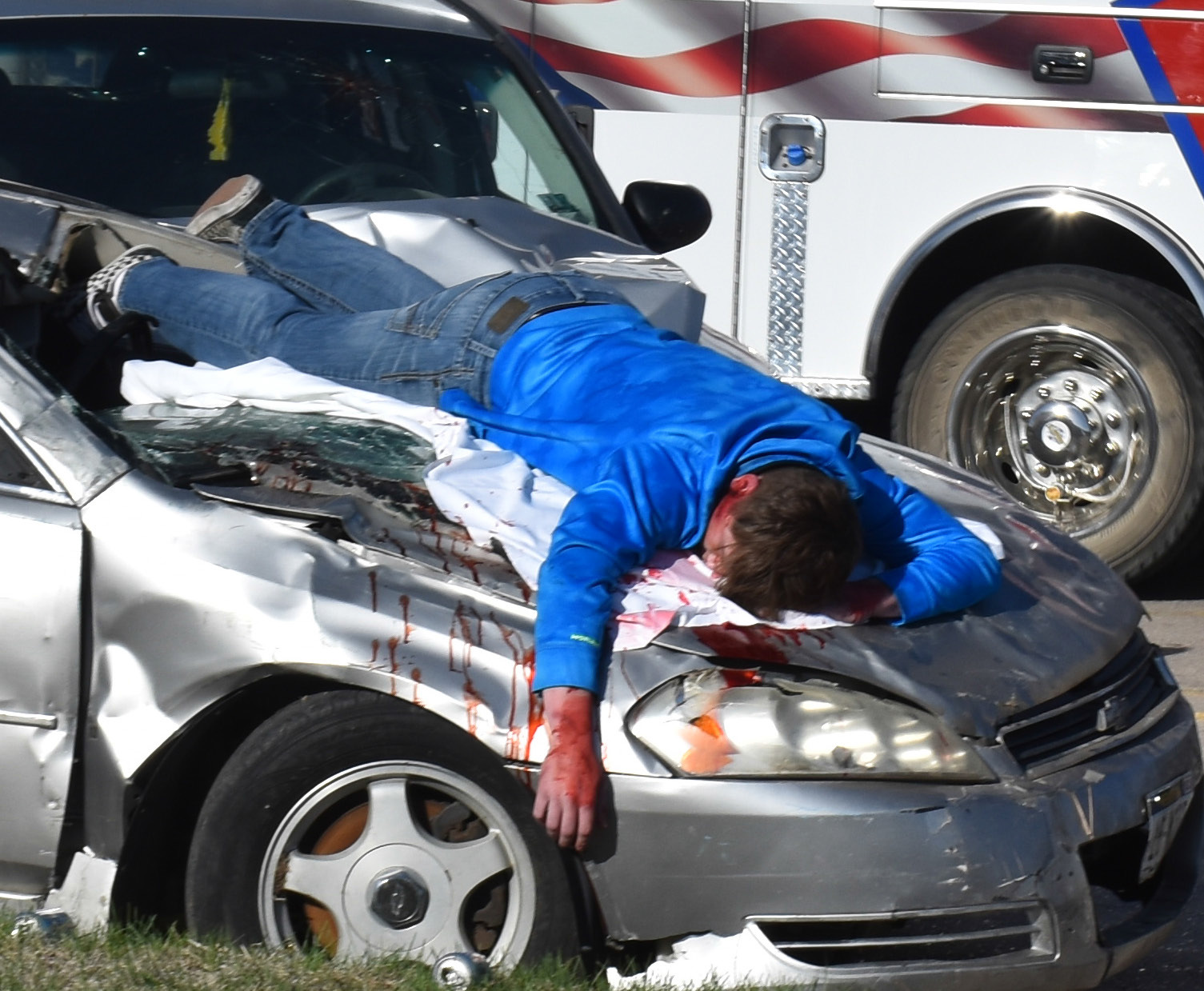Osceola junior Kale Gustafson takes part in the staged car accident to simulate what could happen when a person drinks and drives. Osceola has prom this weekend. PCN photos by Beth Sparrow