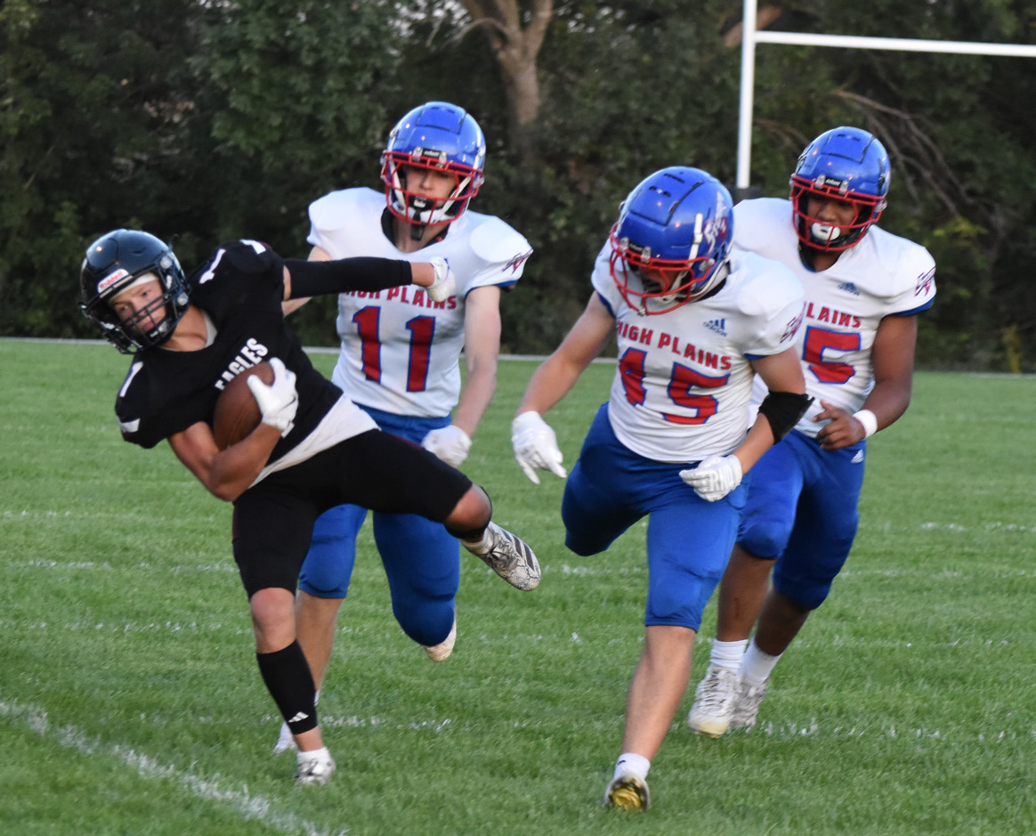 The BDS ball carrier is ushered out of bounds by High Plains defenders, Brodey Spurling (11) Chase Owens (45) and Neddy Lesiak (55). PCN photo by Beth Sparrow