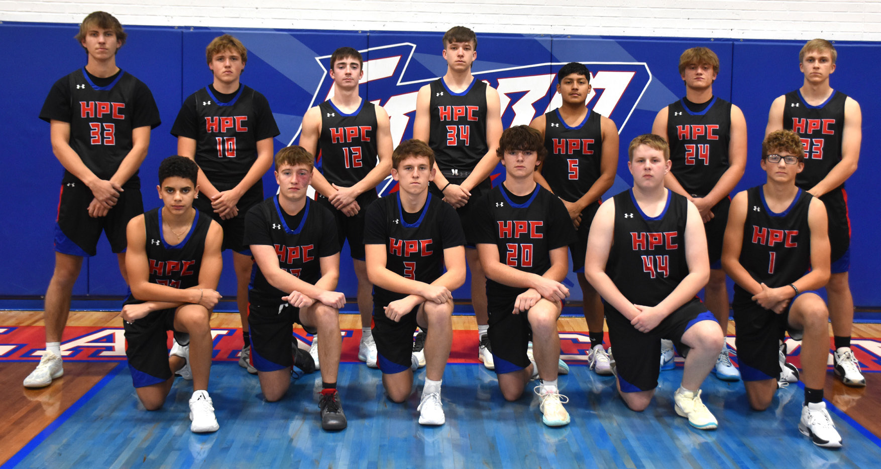 2024-25 HPC Boys Basketball team: (front) Saul Lopez-Santos, Cameron Reed, Carson Swedenburg, Kyler Hans, Leland Pike, Colin Howell; (back) Carter Urkoski, Chase Owens, Haden Helgoth, Maddix Fuhrman, Raul Marino, Ayden Hans and Brodey Spurling. PCN photo by Beth Sparrow.