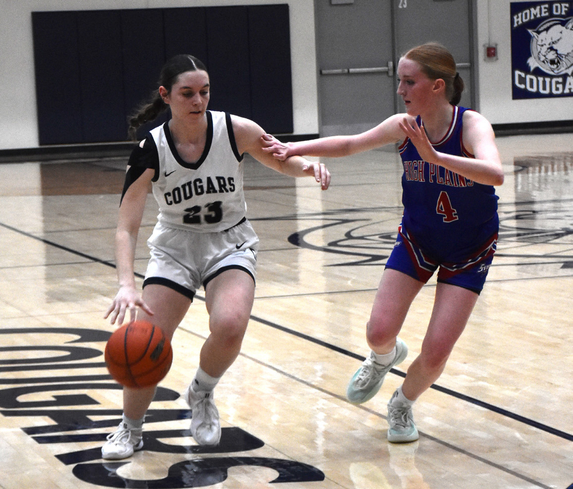 Lindee Kelley (CC) dribbles the ball while Peyton Hofmann (HPC) defends. PCN file photo by Beth Sparrow.
