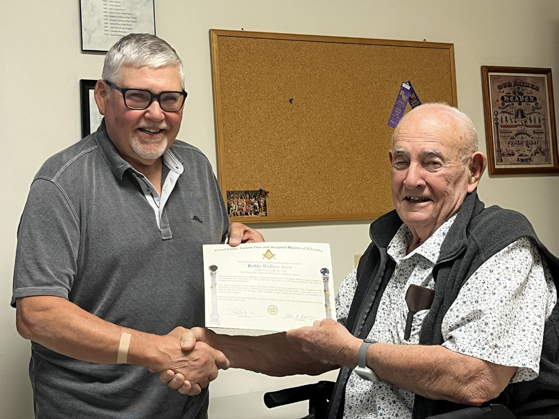 Greg Berggren presents Bob Kreis with his 65 years of membership in Stromsburg Masonic Lodge. Celebrating 60 years of membership is Tom Foster and celebrating 50 years is Kurth DeLand. Photo provided.
