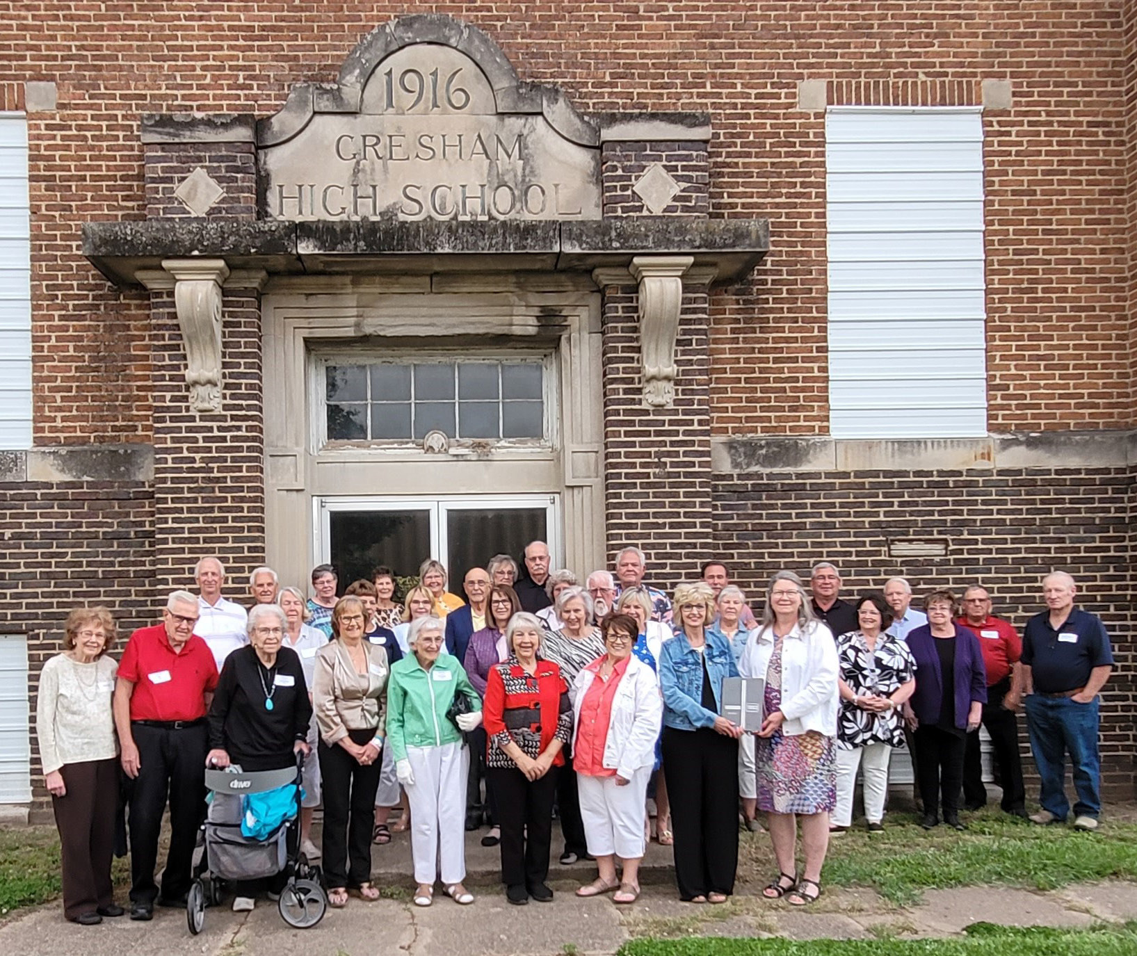 All those in attendance at the 2024 banquet are pictured standing in front of the 1916 building. Photo provided.