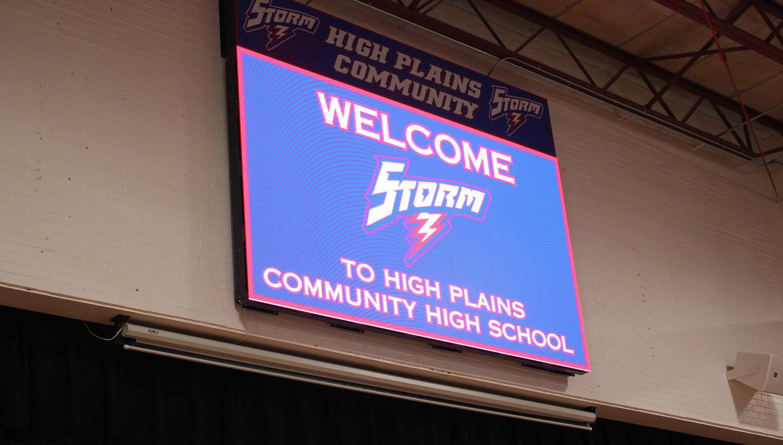 Above: High Plains installed a video board in their gym after much research and discussion. Sponsors are requested. Photo provided.