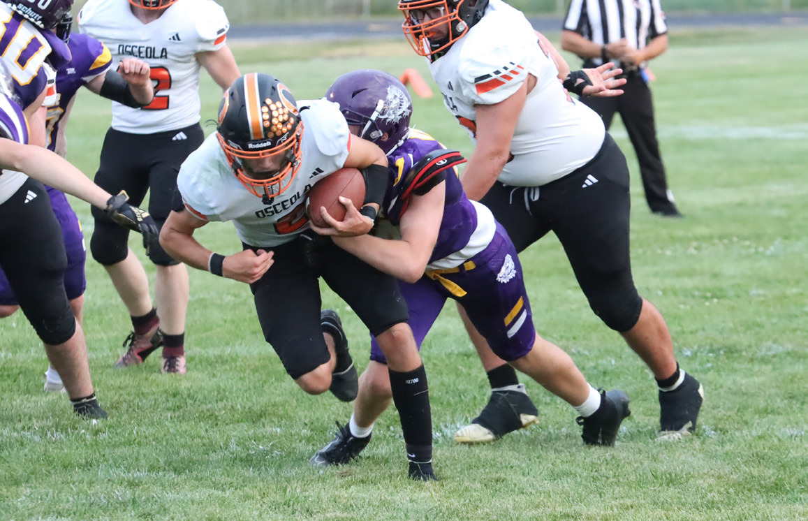 Osceola junior quarterback Jackson Winslow (2) is tackled inside the Deshler five-yard line in the second quarter of Friday nights game in Deshler. Osceola put up a balanced attack, but the Deshler run game proved to be the difference in the 42-36 loss. PCN photo by Ken Kush.