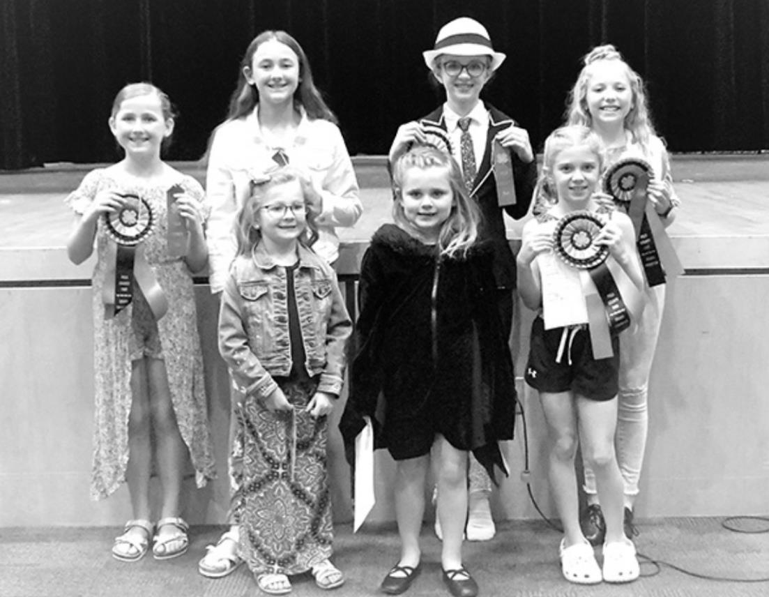 Those participating in the 2022 Performing Arts and Public Speaking Contest were front row (l to r) Cora Stewart, Daphne Mentink, Emma Peterson. Back row (l to r) Alexa Stewart, Mckenna Stewart, Halee Peterson, Aubrey Peterson.