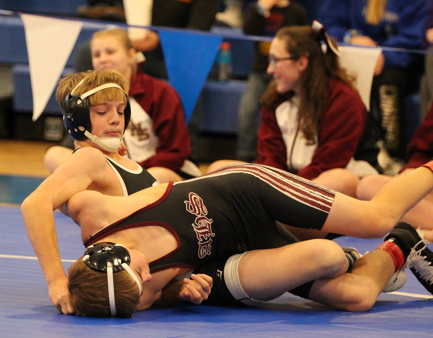 Devin Nuttelman is twisted up trying to pin his opponent. PCN photo by Travis Lane