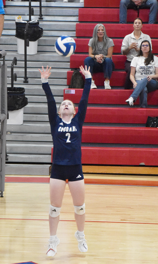 Left- Cross County sophomore Piyper Berggren (2) sets up the Cougars front line. Right- Senior Saphira Osentowski is on the attack against the H &amp; H defense. PCN photos by Beth Sparrow.
