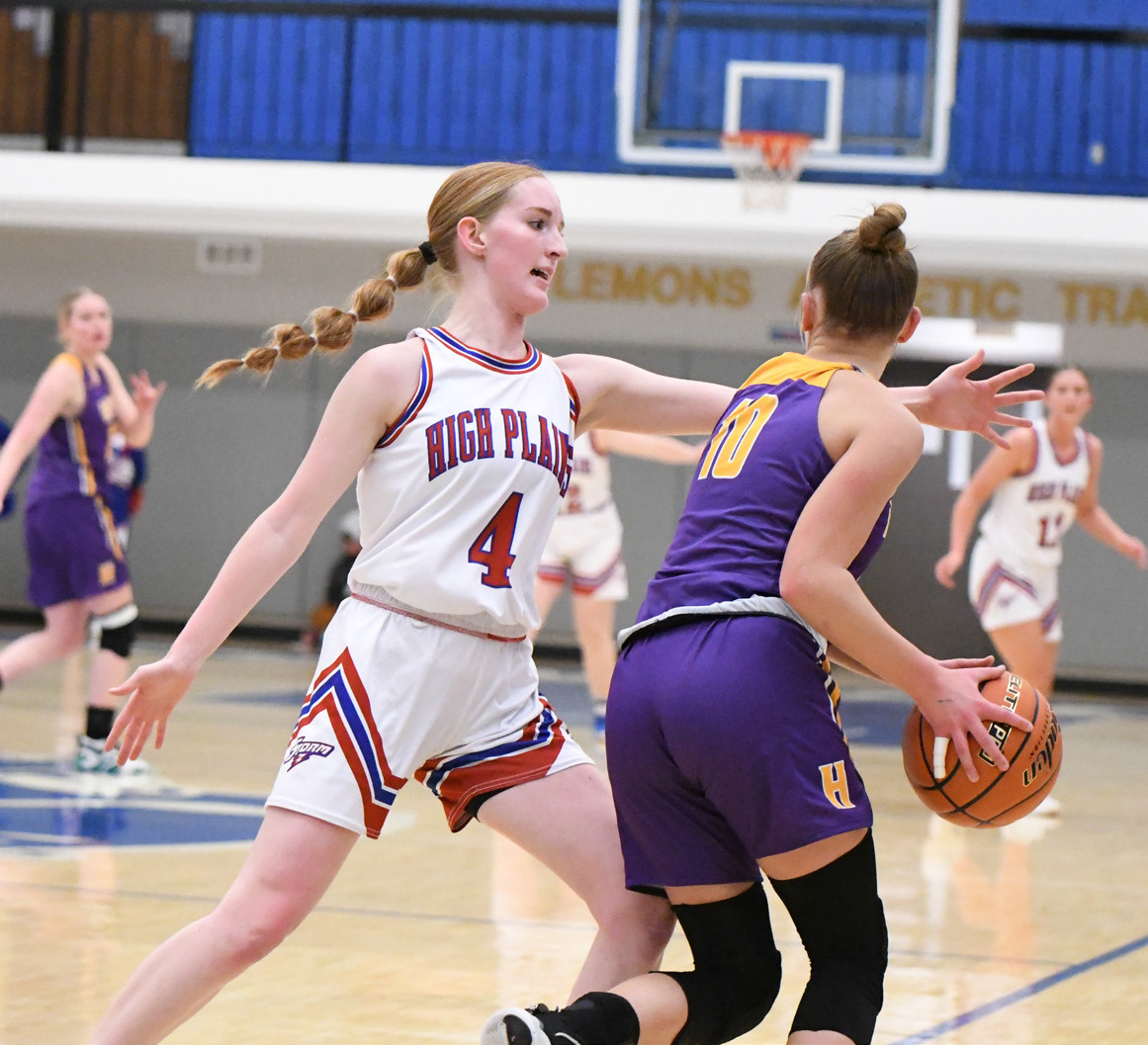 Peyton Hofmann blocks a Hampton opponent from passing . PCN photo by Rick Holtz.