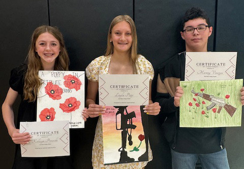  Top right: Poppy poster award winners, 1st Kalisyn Prososki, 2nd Layla Page and 3rd Manuel Venegas.