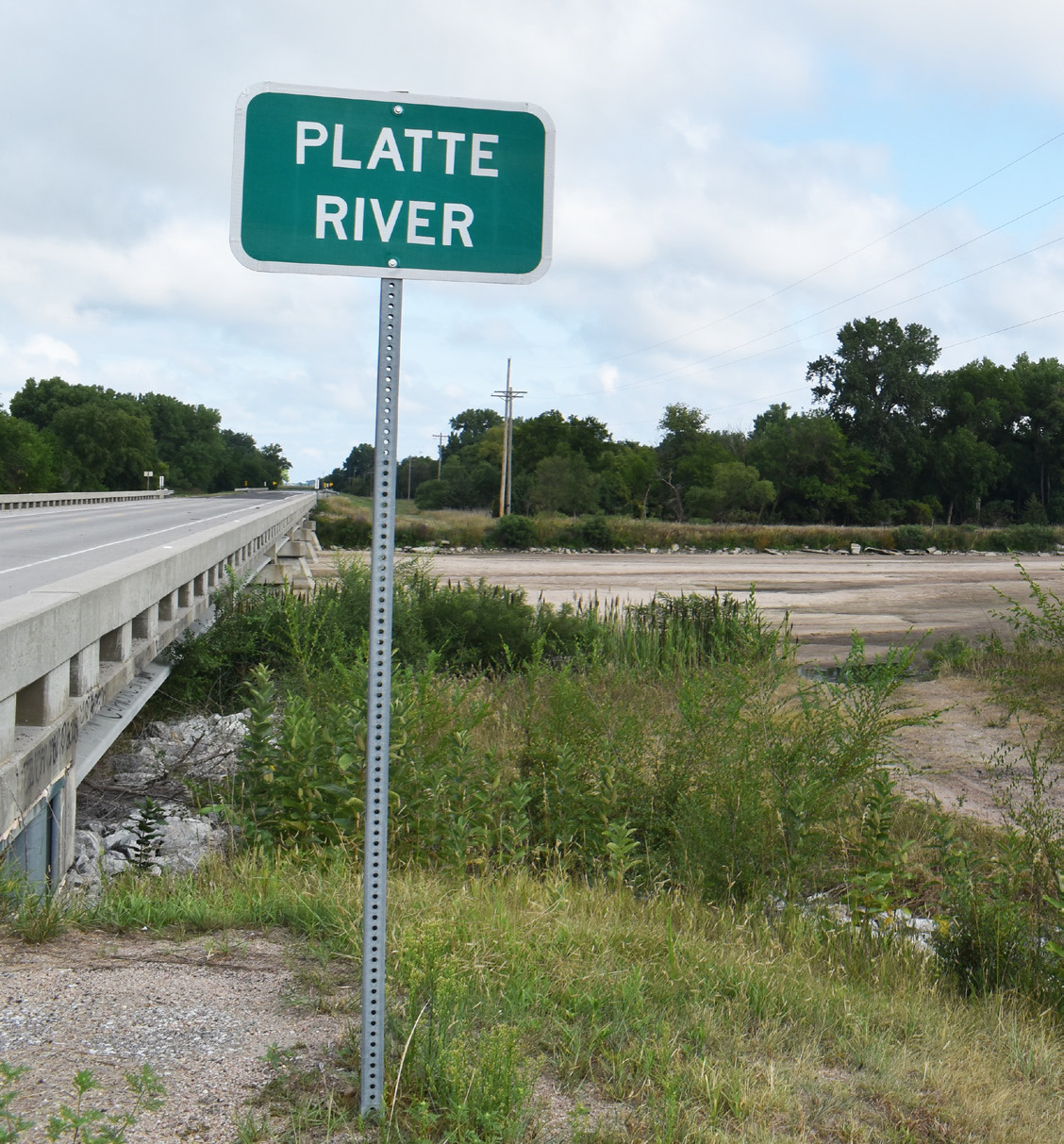 The Platte River is not very river-like these days. Lack of rainfall has led to a dried riverbed. Polk County News Photos by Beth Sparrow