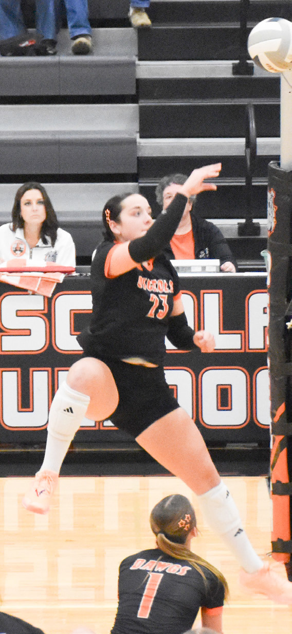 Left- Osceola senior Bella Recker led the Bulldogs past the East Butler Tigers on Monday night with 18 kills in their 3-0 sweep to advance to the finals of the D1-4 subdistrict tournament at Osceola. Right- Cross County senior Cortina Donnelly had six kills, one block and two ace serves as the Cougars saw their season come to an end losing in three straight sets to Aquinas. PCN photos by Beth Sparrow.