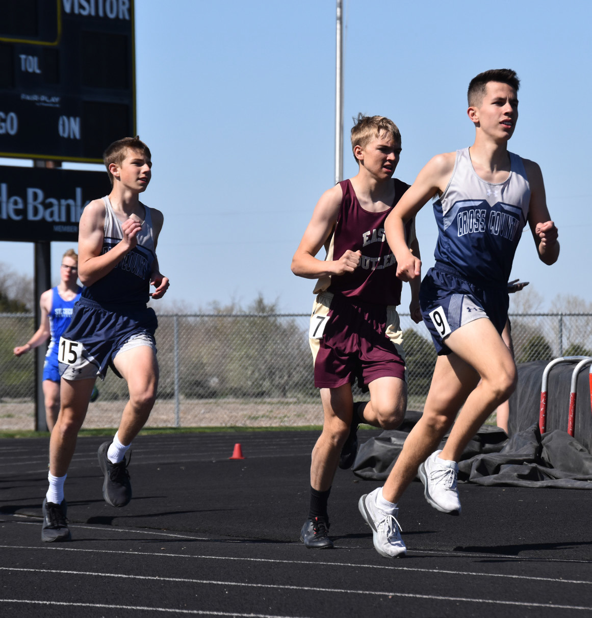 Above: Matthew Frazier (left, CC) and Revin Nyberg (right, CC) run in the 1600 meters. PCN photo by Cienna Friesen.