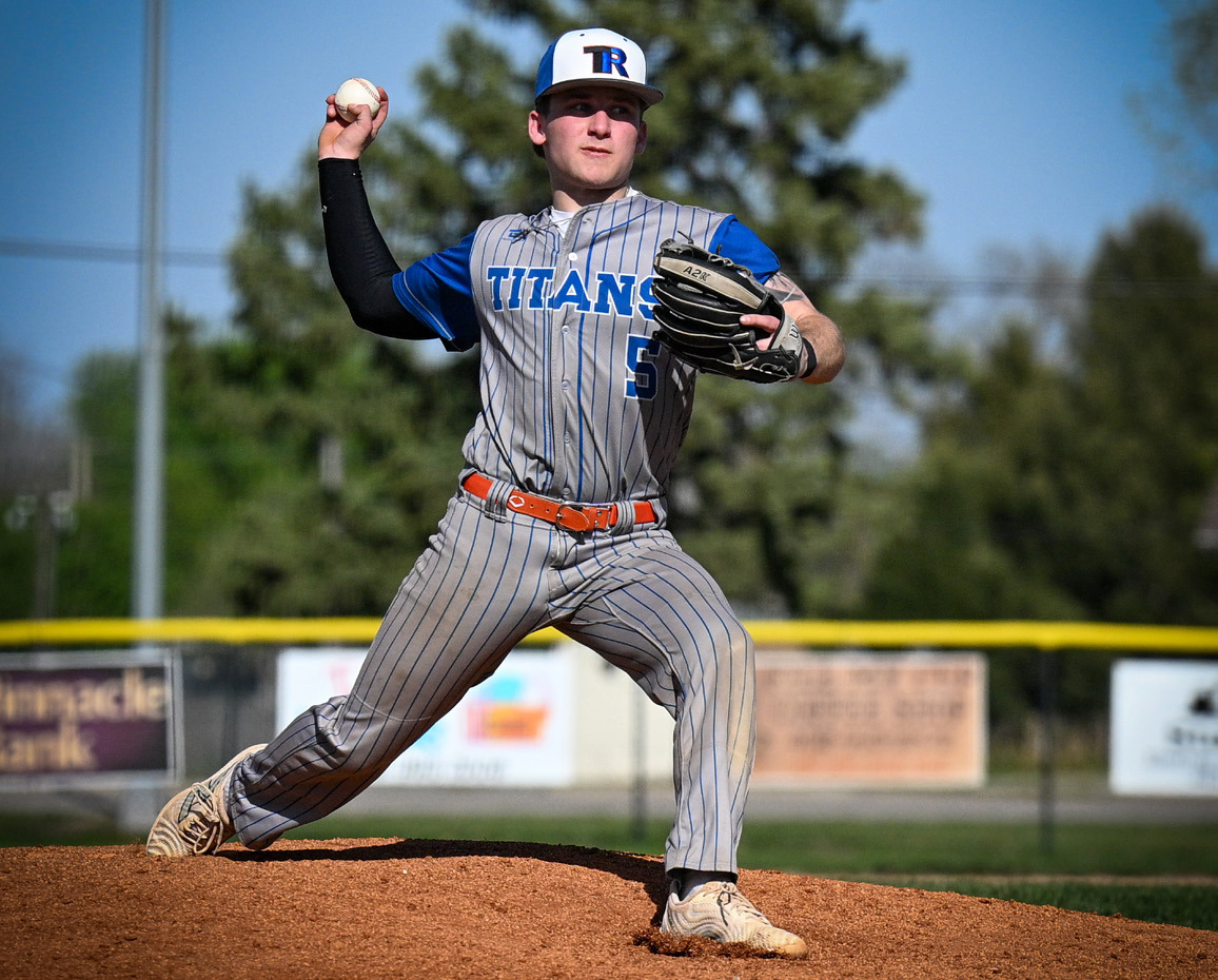 Twin River Titans Aden Feezell allowed 12 runs against Wayne last Tuesday, but only four of the runs were earned as the Titans defense committed four errors. He allowed six hits and struckout three batters. Nance County Journal photo by Jen Johnson.