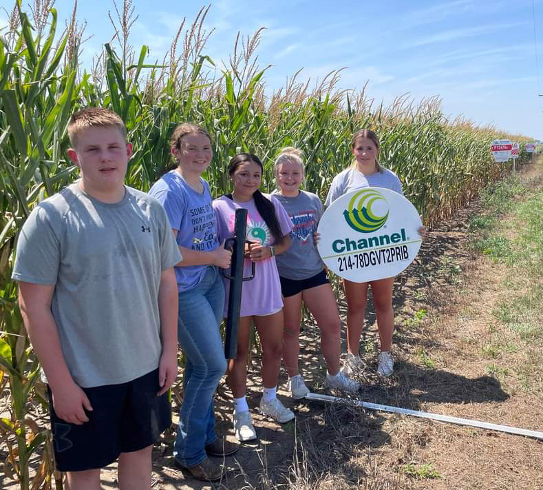 High Plains FFA members installed field signs for the chapter corn yield trial on Tuesday, which was a hot sunny day reaching 100 degrees. Lindburgs provided the ground and many seed companies provided seed. Photo provided.