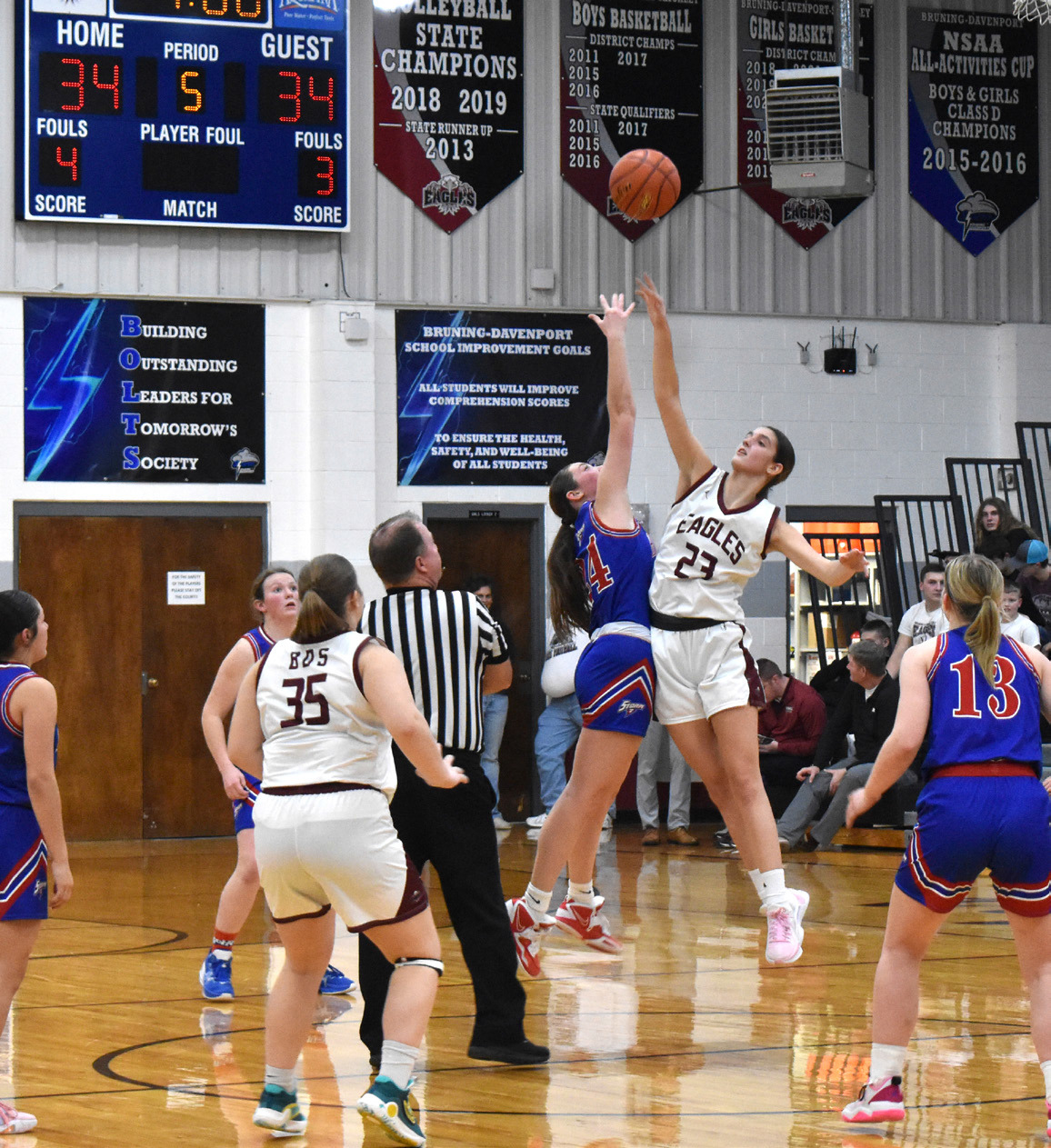 Rylee Ackerson starts overtime with the tipoff. PCN photo by Cienna Friesen.
