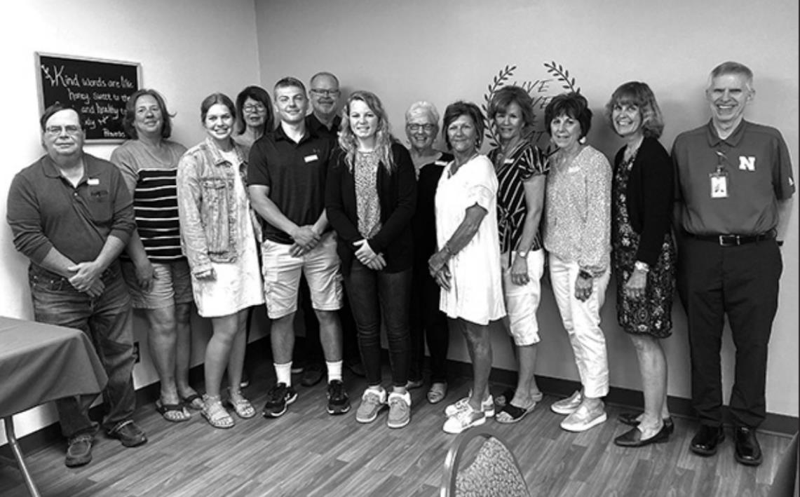 Pictured are Foundation for Annie Jeffrey Board members with the recipients (left to right): John Girard, Kathy Gabel, Blaike Bryan, Mary Lerch, Lane Urkoski, Steve Peterson, Trinity Boden, Karen Stevens, Jane Watts, Margie Hayes, Lana Waller, Susan Chrastil, Foundation Director and Joe Lohrman, Annie Jeffrey Health Care CEO.