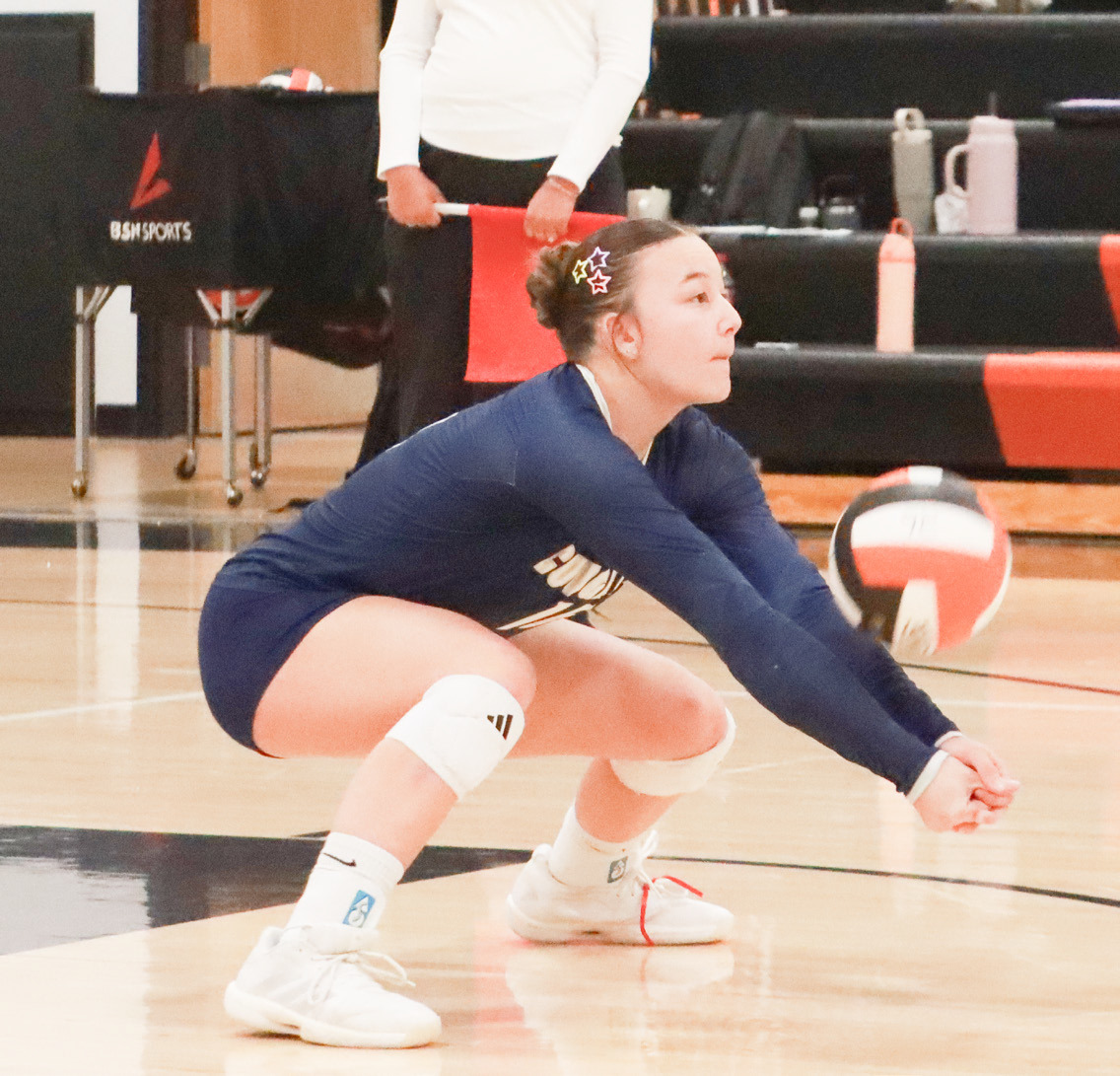 Cross County senior Ava Pruter digs up the pass against Twin River last week. Pruter turned in a solid week as she finished with 25 kills and 26 digs as she helped the Cougars end a four game slide. PCN photo by Ken Kush.