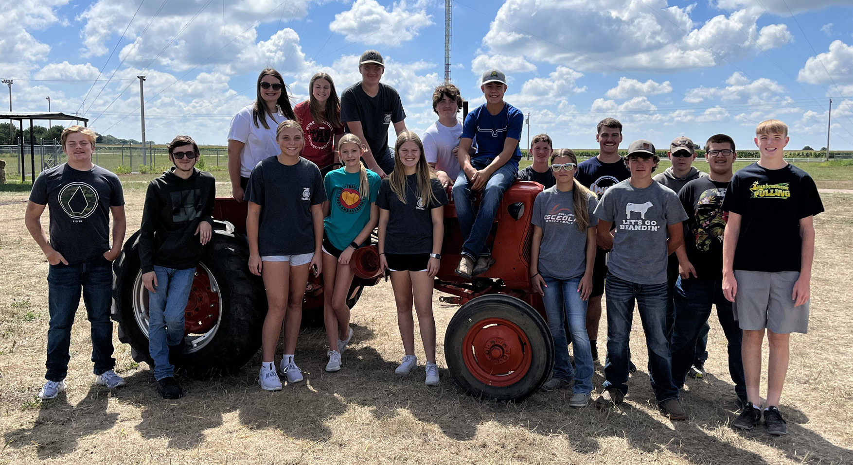 Members of the Osceola FFA are pictured with this tractor. Photo provided.