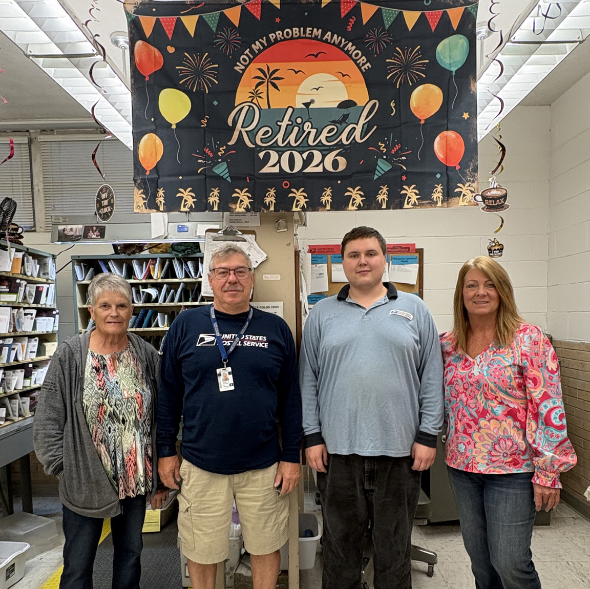 Bob Zelasney celebrates with his coworkers. Pictured are Sue, Bob Zelasney, Levi and Barb. Below: Zelasney sorts some mail before going on his route. PCN photos by Beth Sparrow.