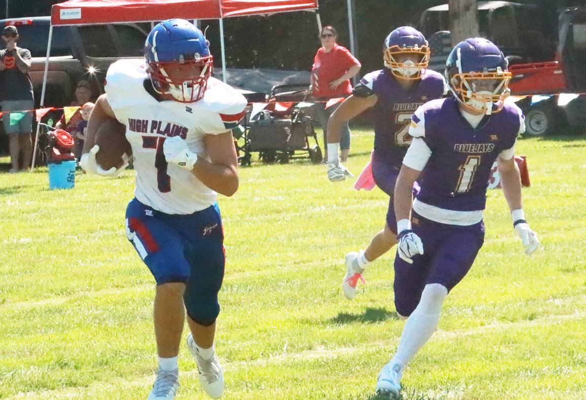 Above- High Plains senior Kyler Hans (7) turns the corner and heads upfield in the Storm’s season opener at Elba three weeks ago. Hans had a huge game as he had nine receptions for 128 yards and three touchdowns in High Plains 63-39 loss at No. 1 Stuart. PCN file photos by Ken Kush