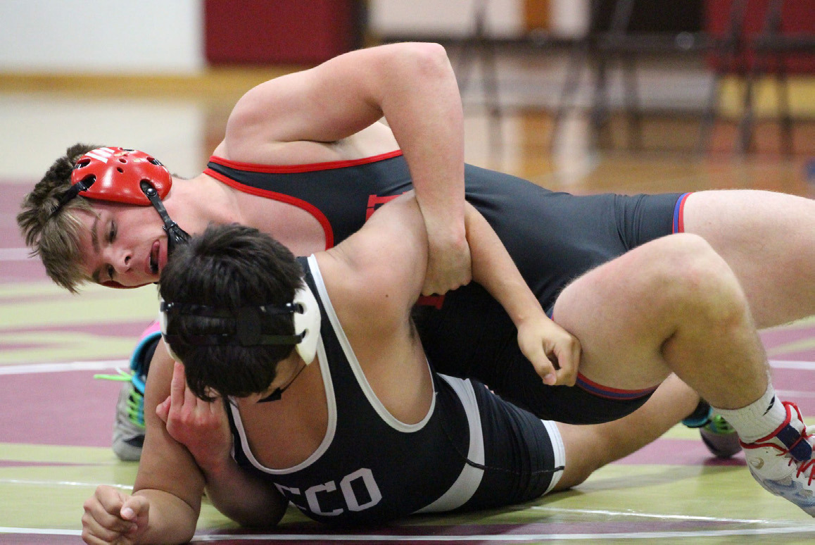 Wyatt Urkoski (HPC) wrestles Calob Troy (CCO) in the triangular at East Butler. PCN file photo by Travis Lane.