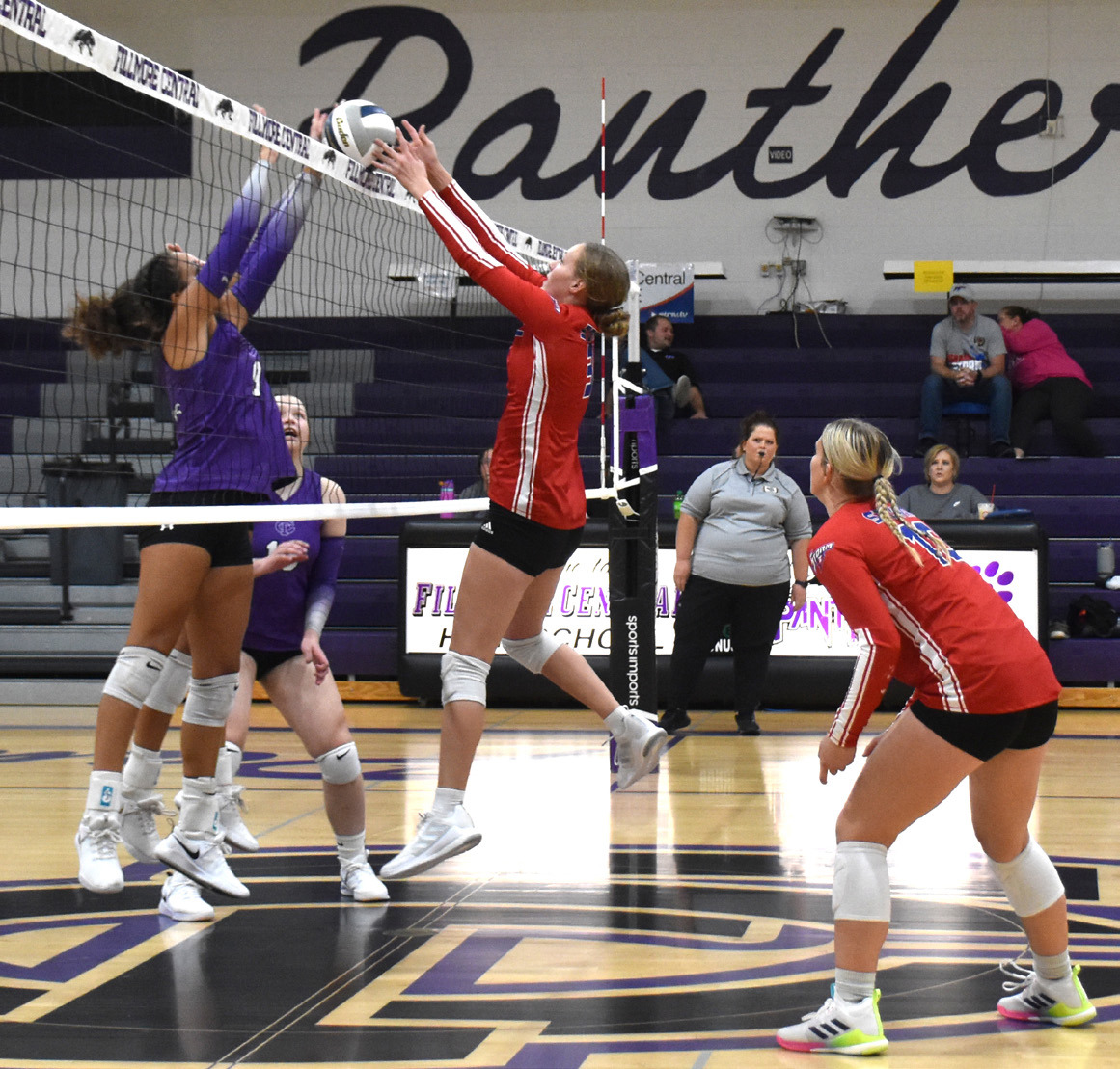 Rylee Hofmann goes up for a block against Fillmore Central on Thursday as Courtney Carlstrom backs her up. PCN photo by Beth Sparrow.