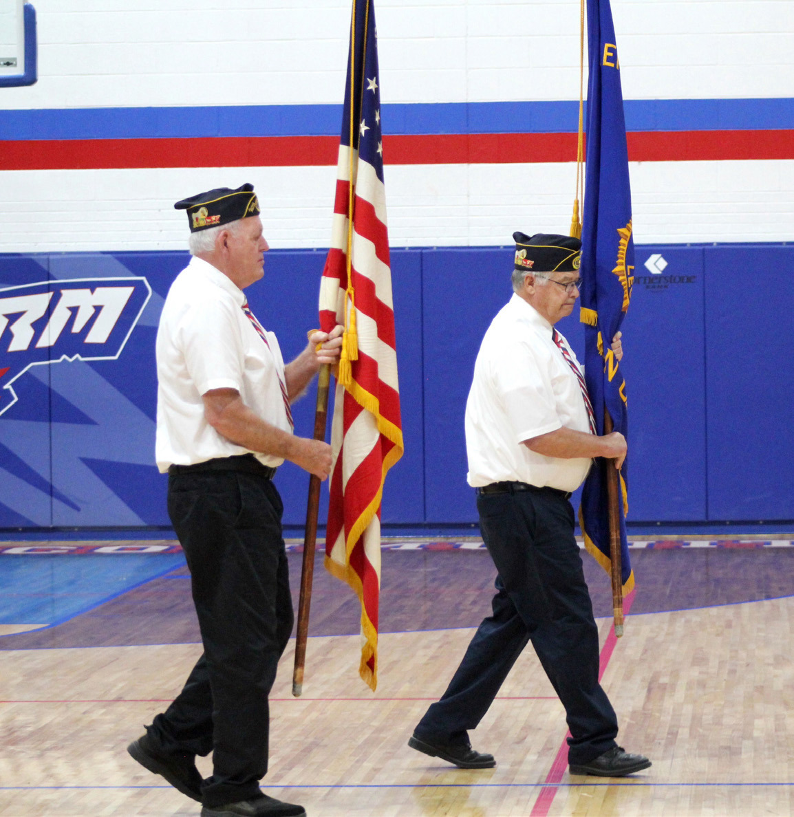 Above: Veterans carried the flags for the Polk program at High Plains. Below: The high school choir provided a vocal number. Photos provided.