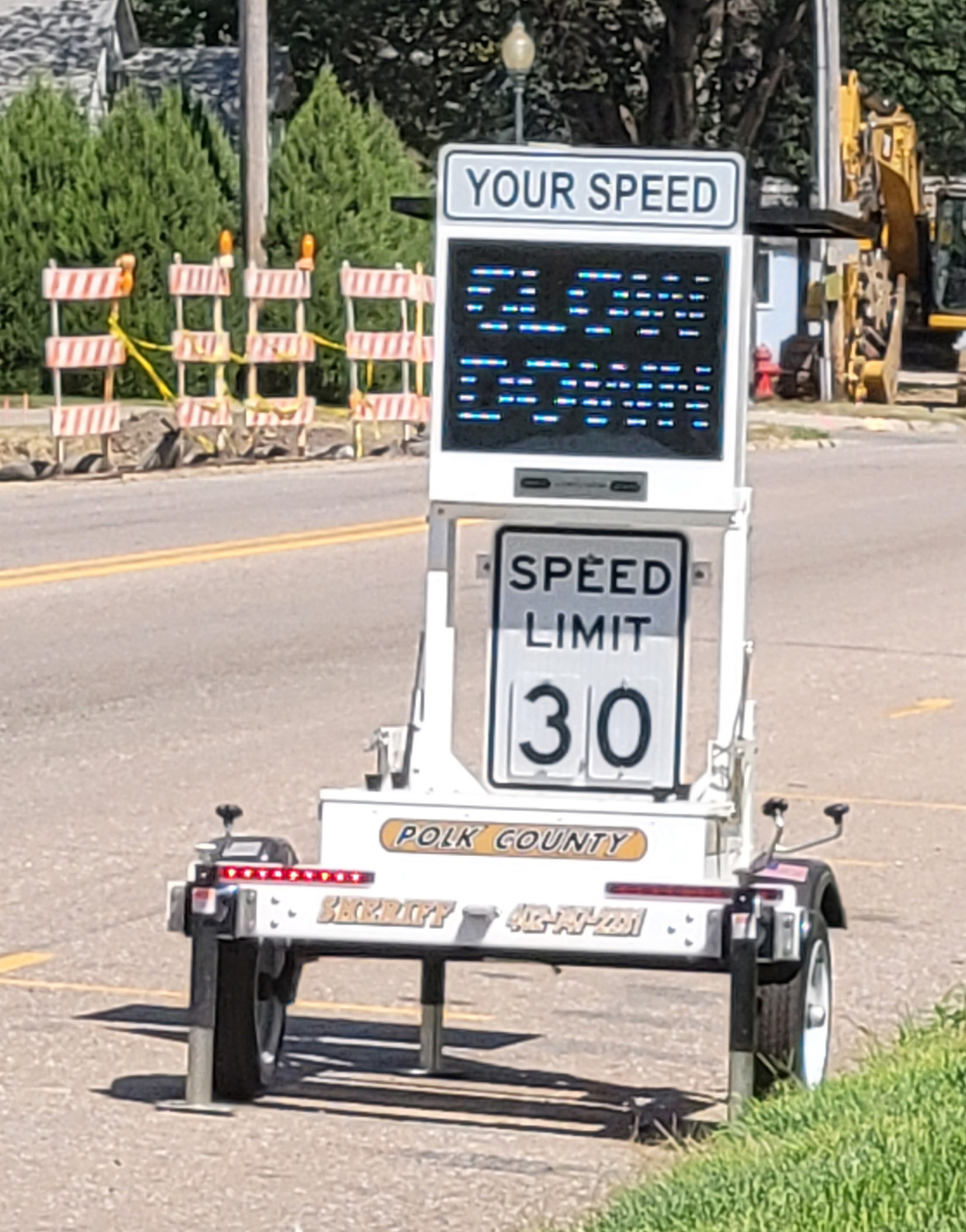 These signs may be found in Polk County encouraging drivers to slow down. PCN photo by Beth Sparrow.