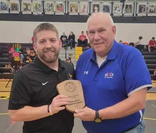 Coach Tanner Kuhn was awarded the 2023 Coach of the Year by the Nebraska Scholastic Wrestling Coaches Association (NSWCA) at the Shelby-Rising City meet on Saturday. Photo provided.