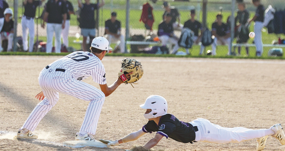 Easton Cattau dives back into first base on the attempted pick-off throw by the Albion pitcher during last Thursday night;s game. PCN photo by Blaine Winslow.