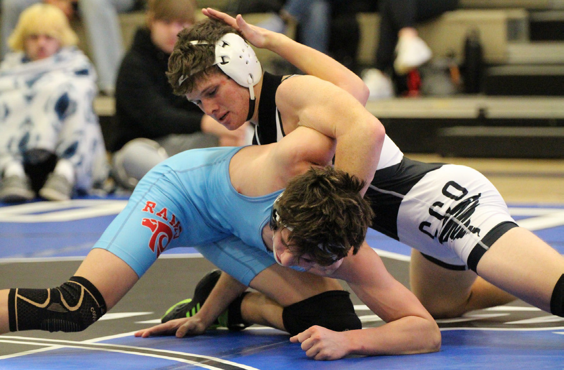 Top- Cross County/Osceola junior Jed Berggren was the bracket champion at 150 pounds. 
