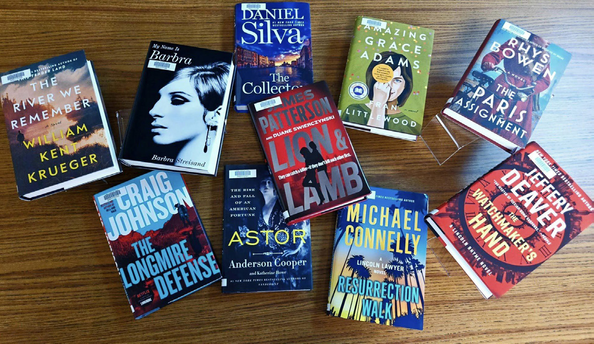 Read a new book in the new year! Pictured are new books at the library by authors such as Craig Johnson, Michael Connelly, Barbra Streisand, Jeffery Deaver, Rhys Bowen, James Patterson and others. Check one out. Photo provided.