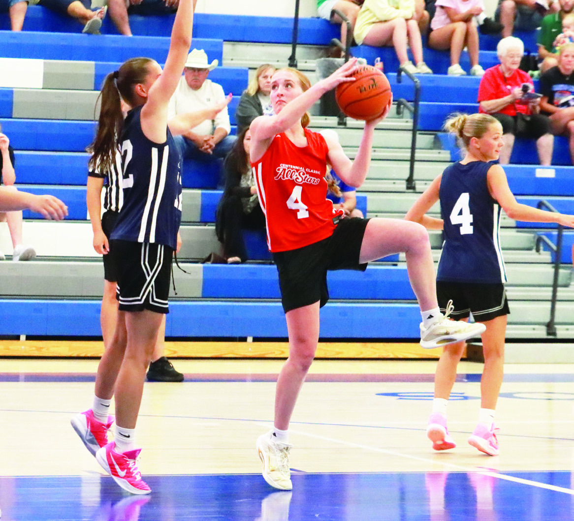 High Plain’s Peyton Hofmann gets off the lefthanded hook for two of her 10 points in Tuesday’s Centennial All-Star Classic. PCN photo by Ken Kush.