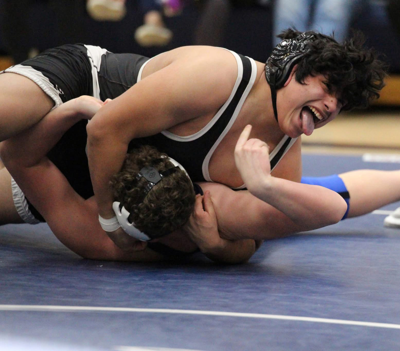 Joaquin Alvarez-Rodriguez is happy to pin his Nebraska Christian opponent in the triangular held last week. PCN photo by Travis Lane.