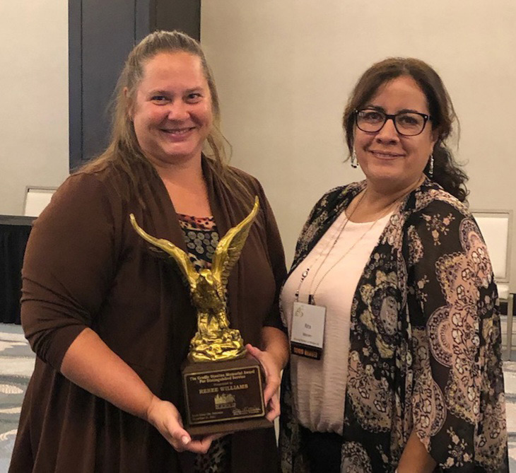 Pictured is Renee Williams with the award and the Nebraska Chapter of NAHRO President, Rita Morales from Housing Partners of Western Nebraska. Photo provided