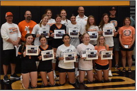 The 2023 girls’ track team received their championship rings during homecoming week in between the junior varsity and varsity volleyball games. PCN photo by Beth Sparrow.