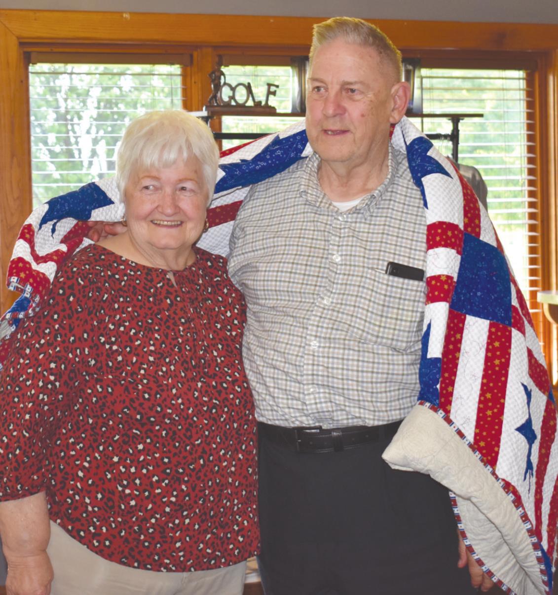 Les Gabriel was presented with a Quilt of Valor Friday night by the Osceola High School Class of 1962. Photo by Beth Sparrow