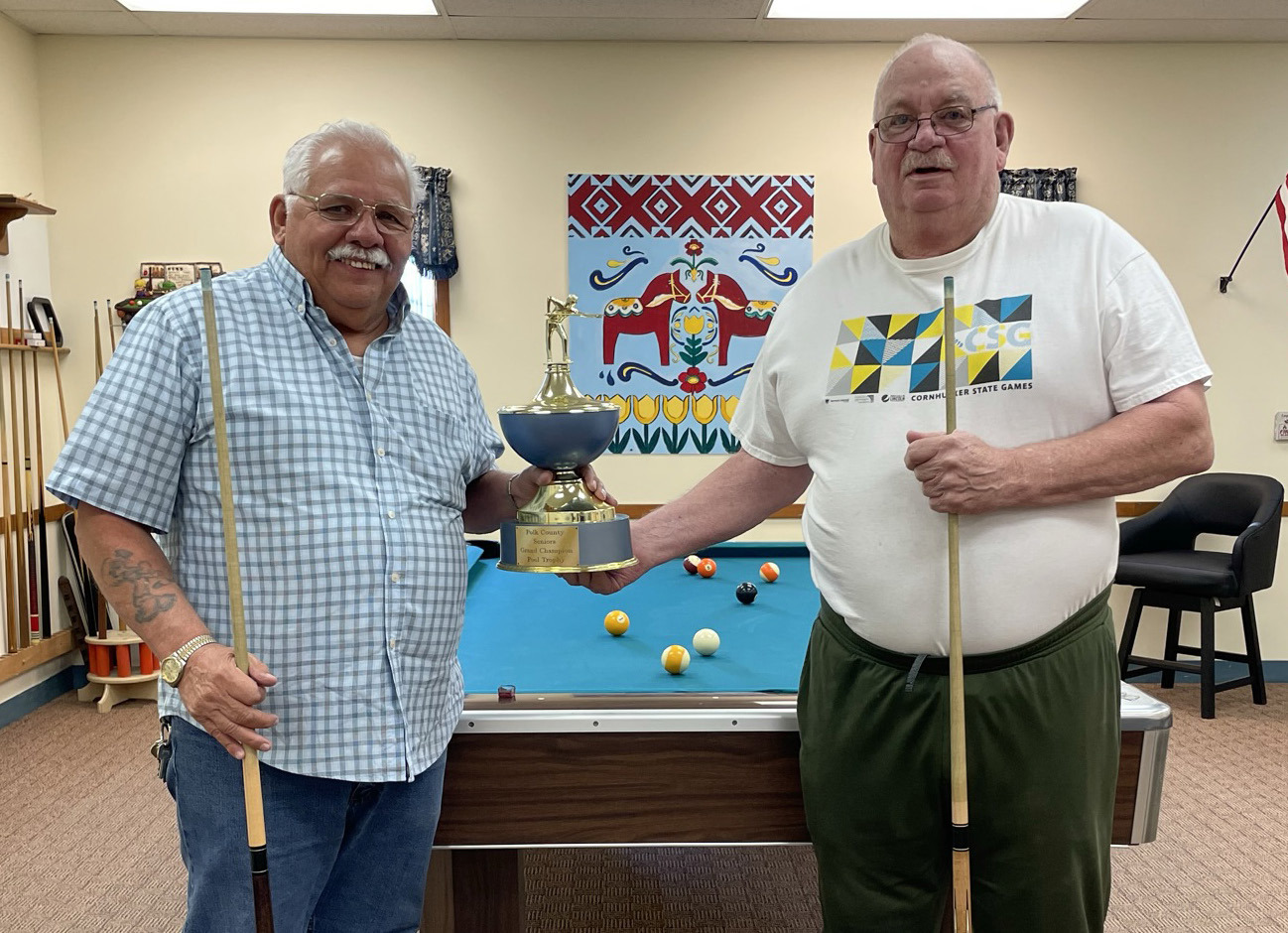 Karl Eckert and Terry Noyd recently brought the county pool trophy to Stromsburg. PCN photo by Rick Holtz
