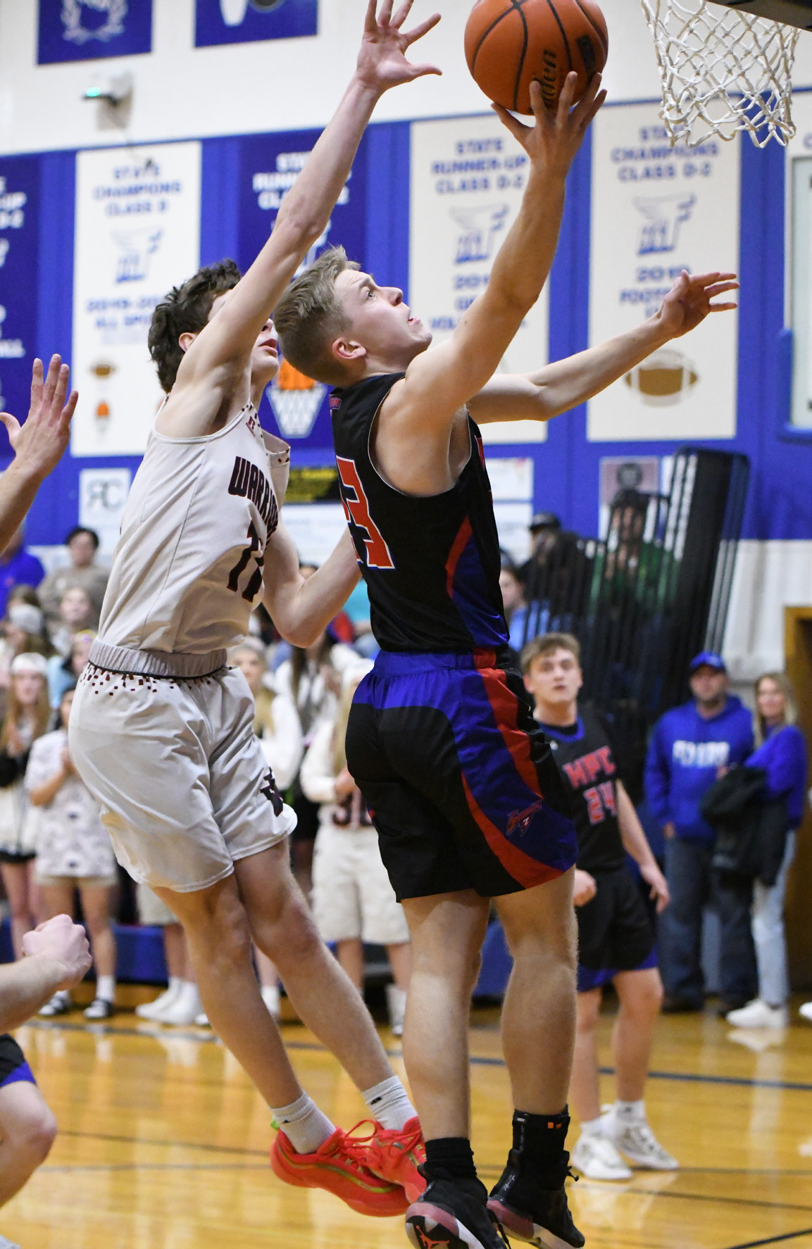 Brodey Spurling tries to put one in against a Warrior. PCN photo by Rick Holtz.